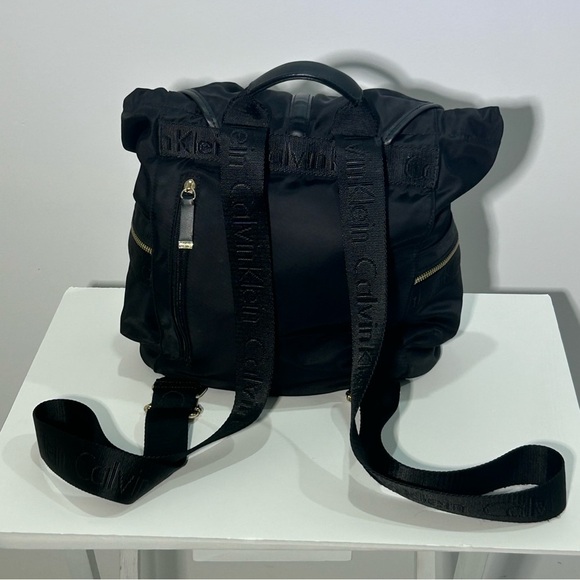 Calvin Klein black backpack with gold hardware - Picture 2 of 7